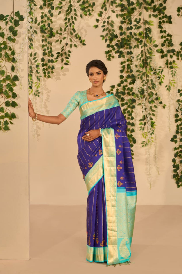 https://pashudh.com/collections/newly-arrived/products/royal-navy-blue-and-aqua-blue-kanjivaram-silk-saree-s1499a