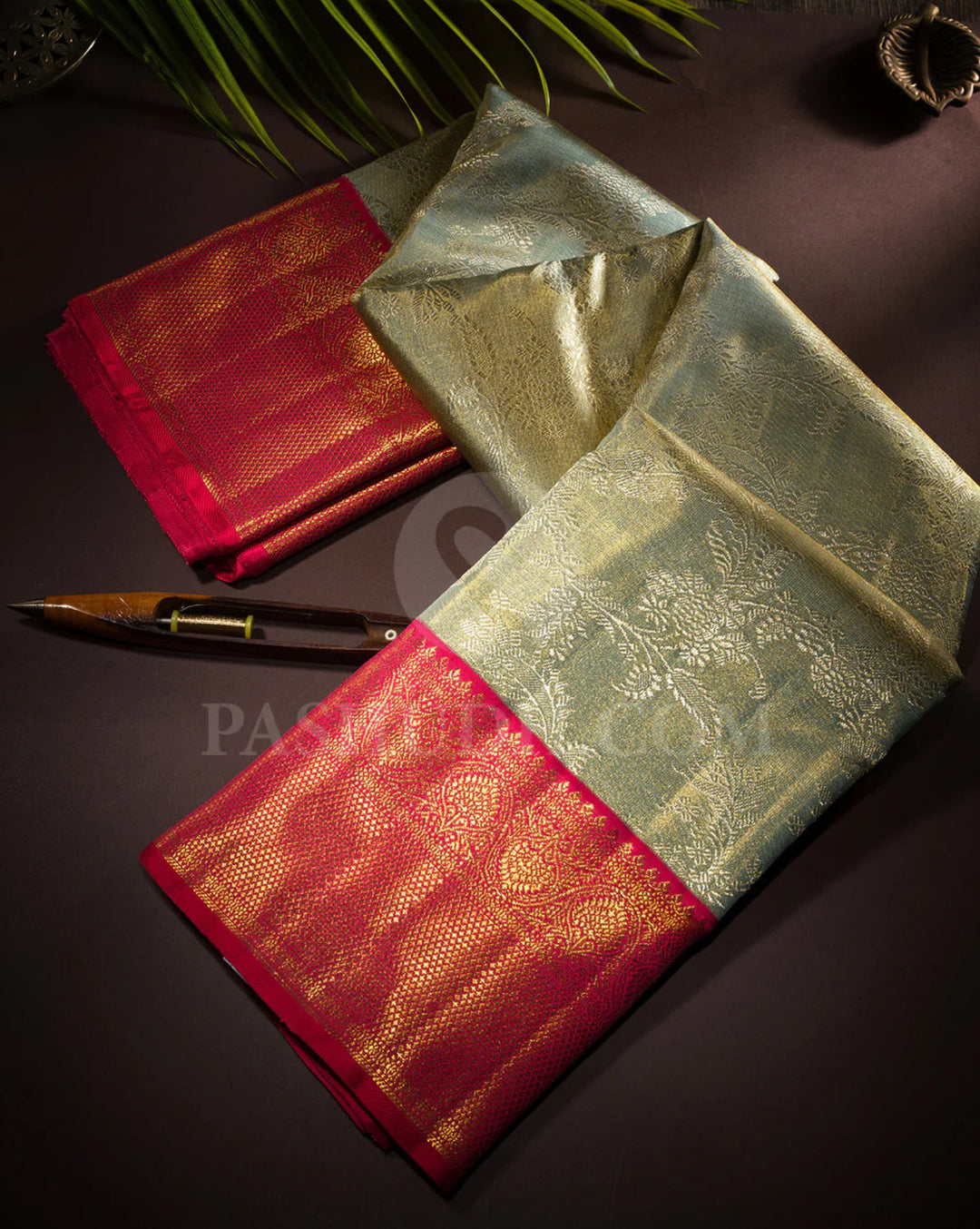https://pashudh.com/collections/view-all-kanjivaram-silk-sarees/products/powder-blue-shot-gold-and-rouge-pink-kanjivaram-silk-saree-s1416a