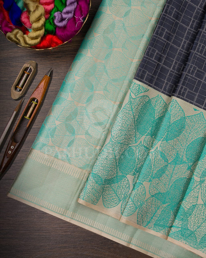 Dark Grey & Half White Silk Saree With Silver Zari & Sky Blue Leaf Patterns - D615(A)